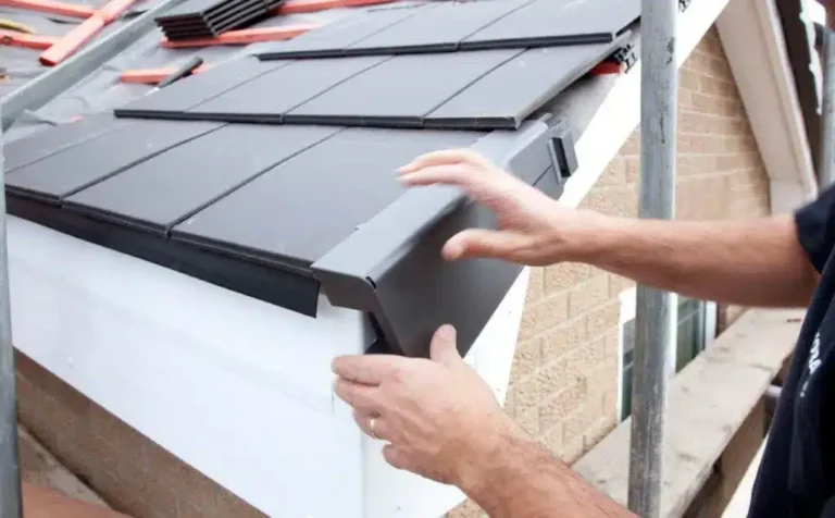 Dry verge capping being fitted to a tiled roof